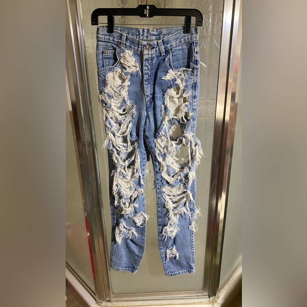 Vintage white label heavily distressed Levi jeans